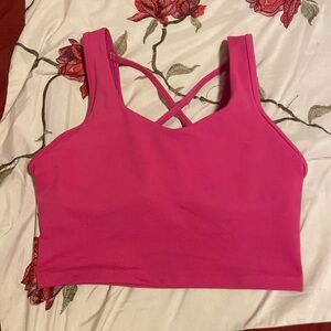 Jessica Simpson workout pink top